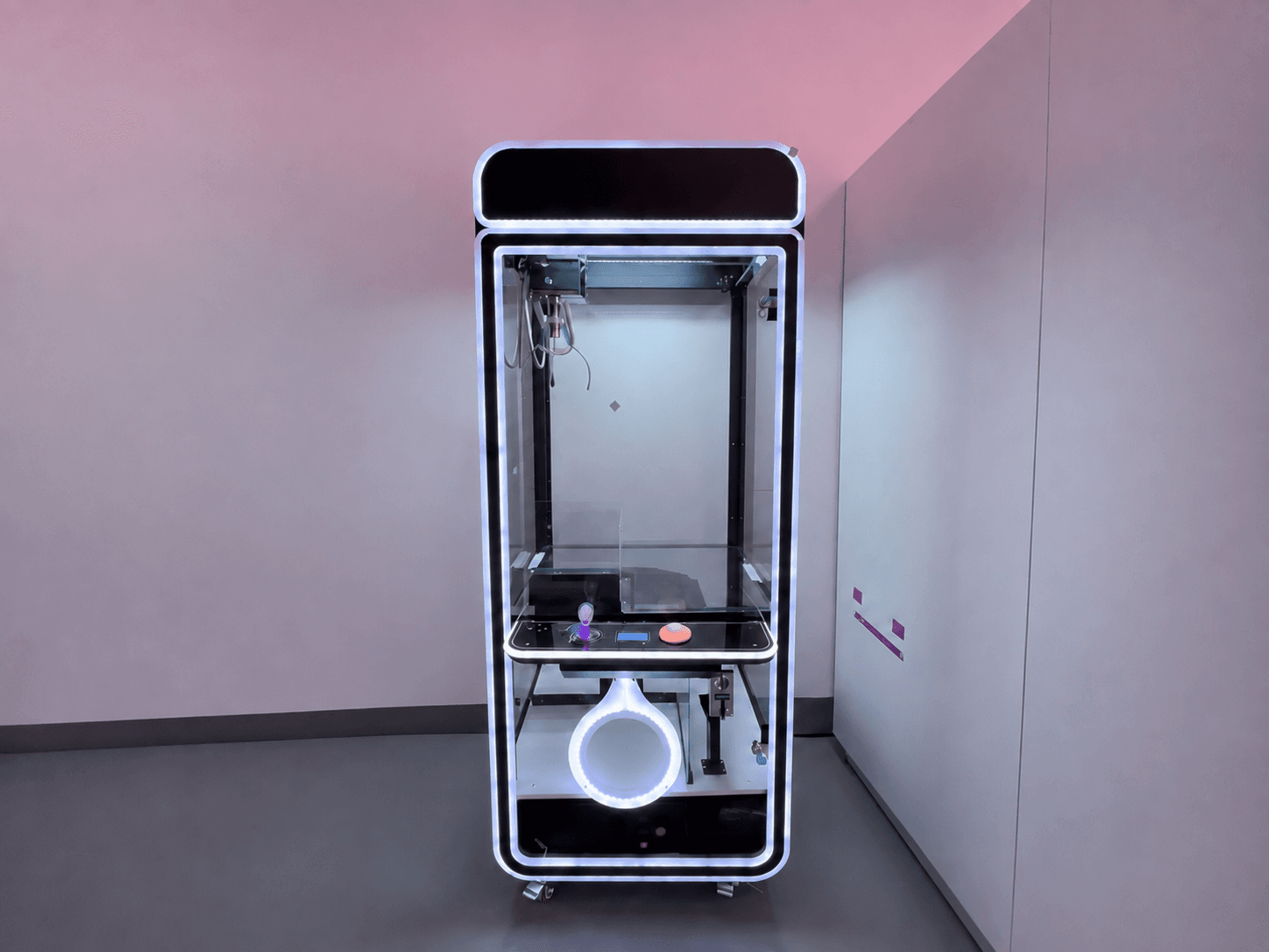 Customizable black arcade claw machine rental for Houston brand activations and trade shows.