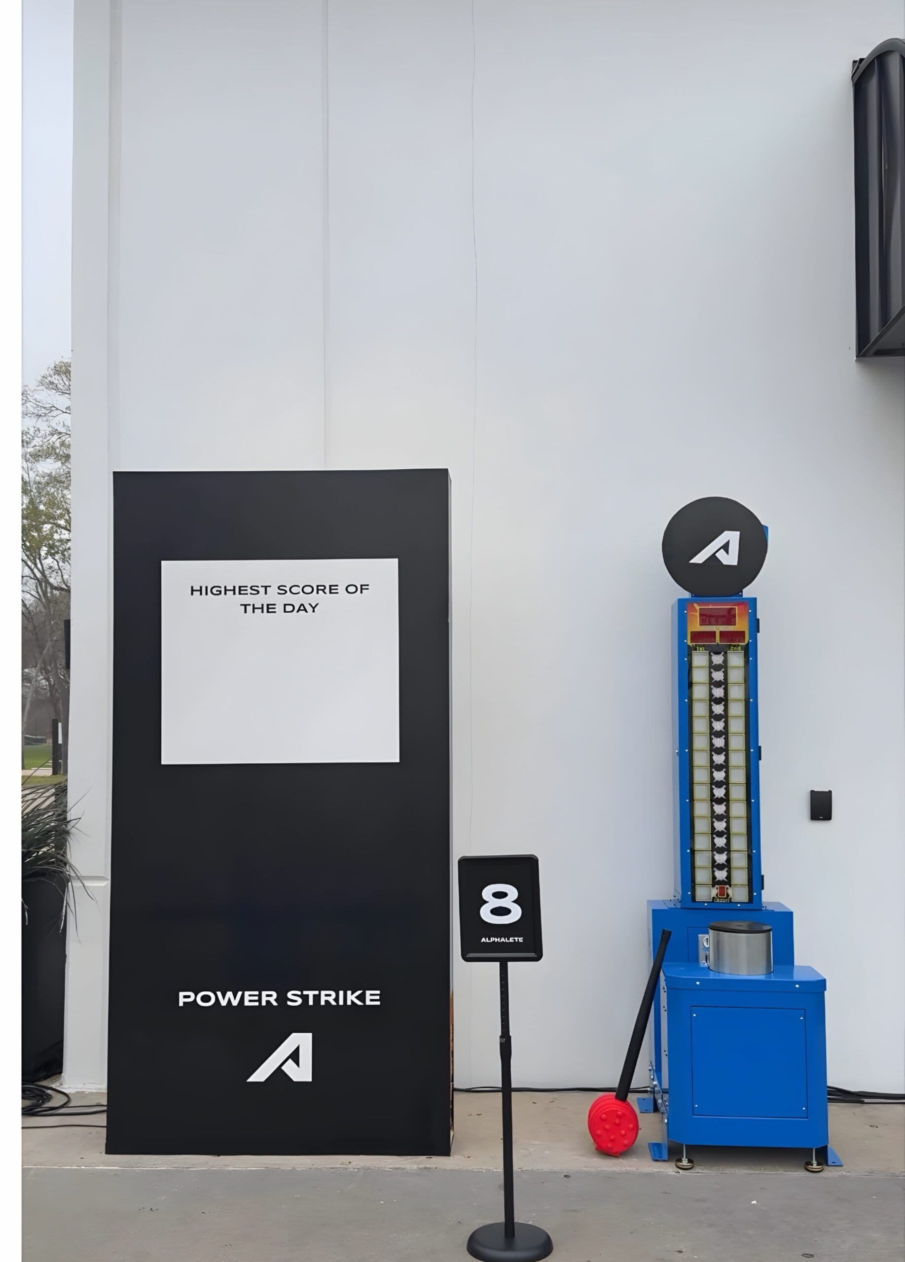 LED high striker strength tester at a Texas Gym Opening